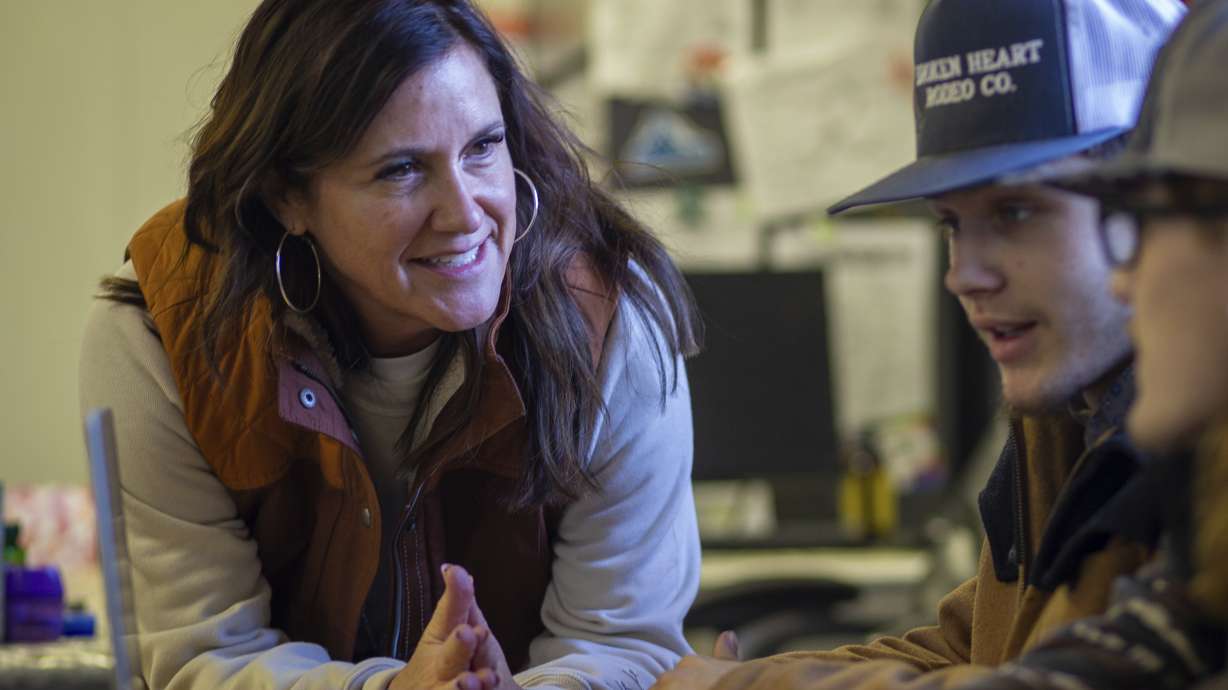 Brittany Ohman, an advisor for the Hope Squad, talks with Cutter Wasylow and another student during a Hope Squad class at Rigby High School in Rigby, Idaho, on Feb. 5.