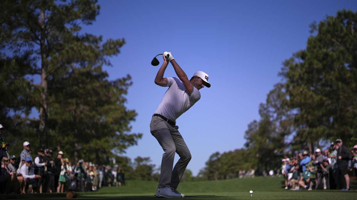 Laurie Canter, of England, hits from the 15th tee during a practice round at the Masters golf tournament, Tuesday, April 8, 2025, in Augusta, Ga.