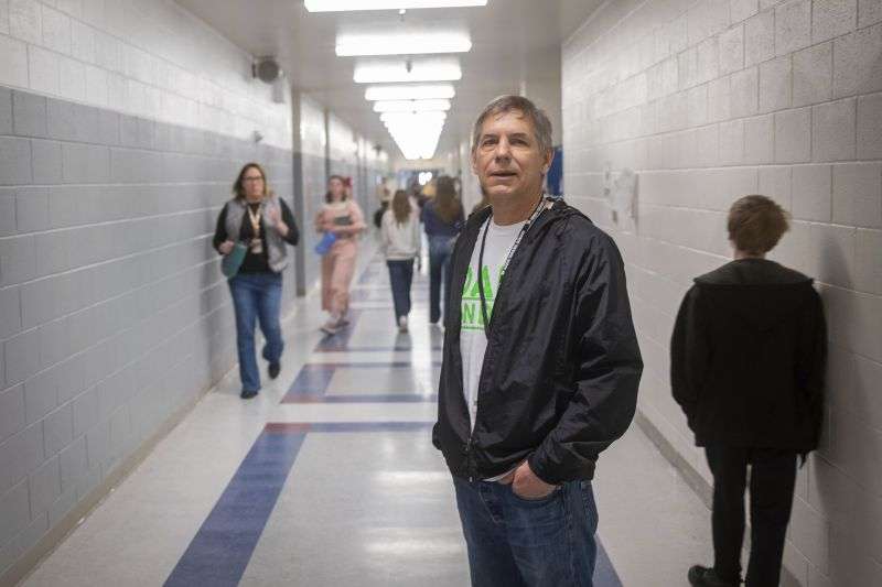 Ernie Chavez, a volunteer with Dads on Duty, poses for a photo at Rigby Middle School in Rigby, Idaho, on Feb. 5.