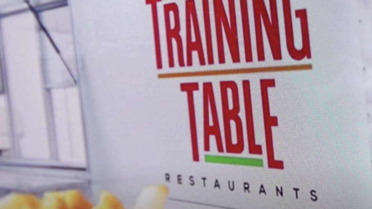 Signage from the Training Table Restaurants food truck.