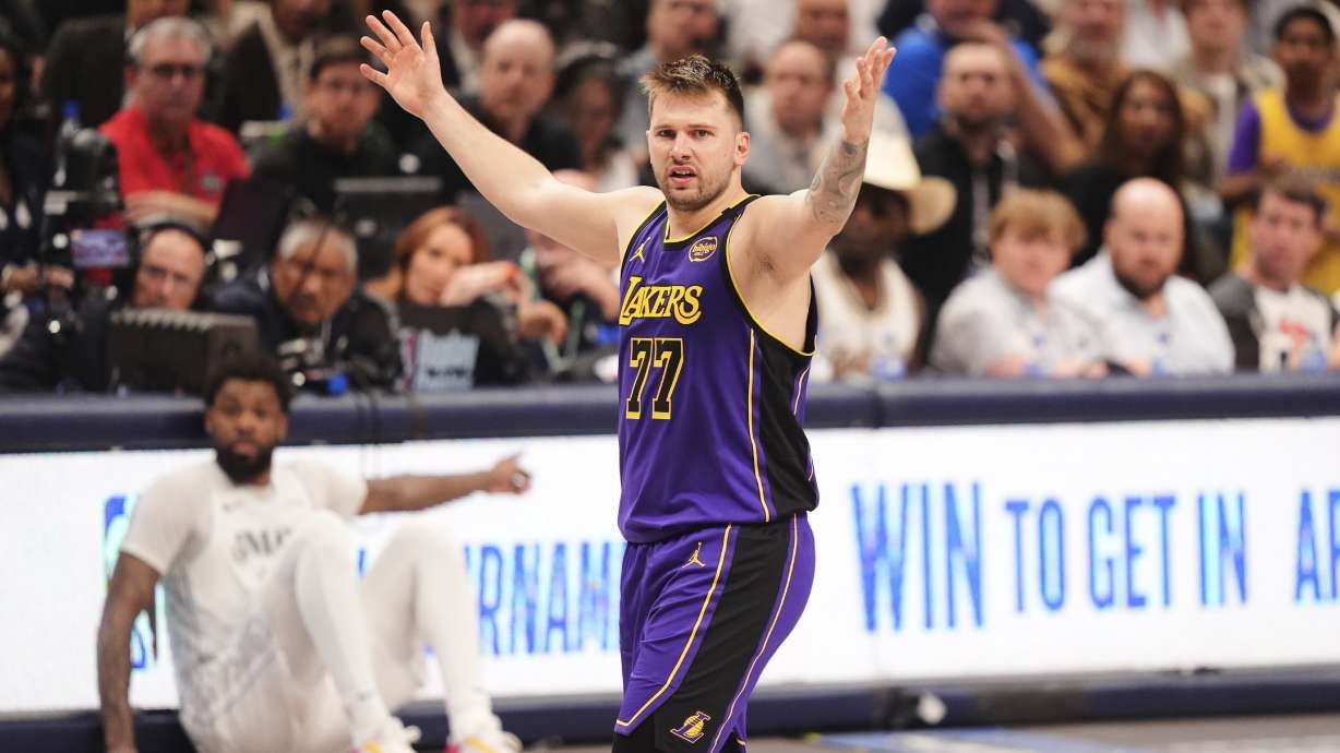 Los Angeles Lakers' Luka Doncic (77) reacts to play in the second half of an NBA basketball game against the Dallas Mavericks in Dallas, Wednesday, April 9, 2025.