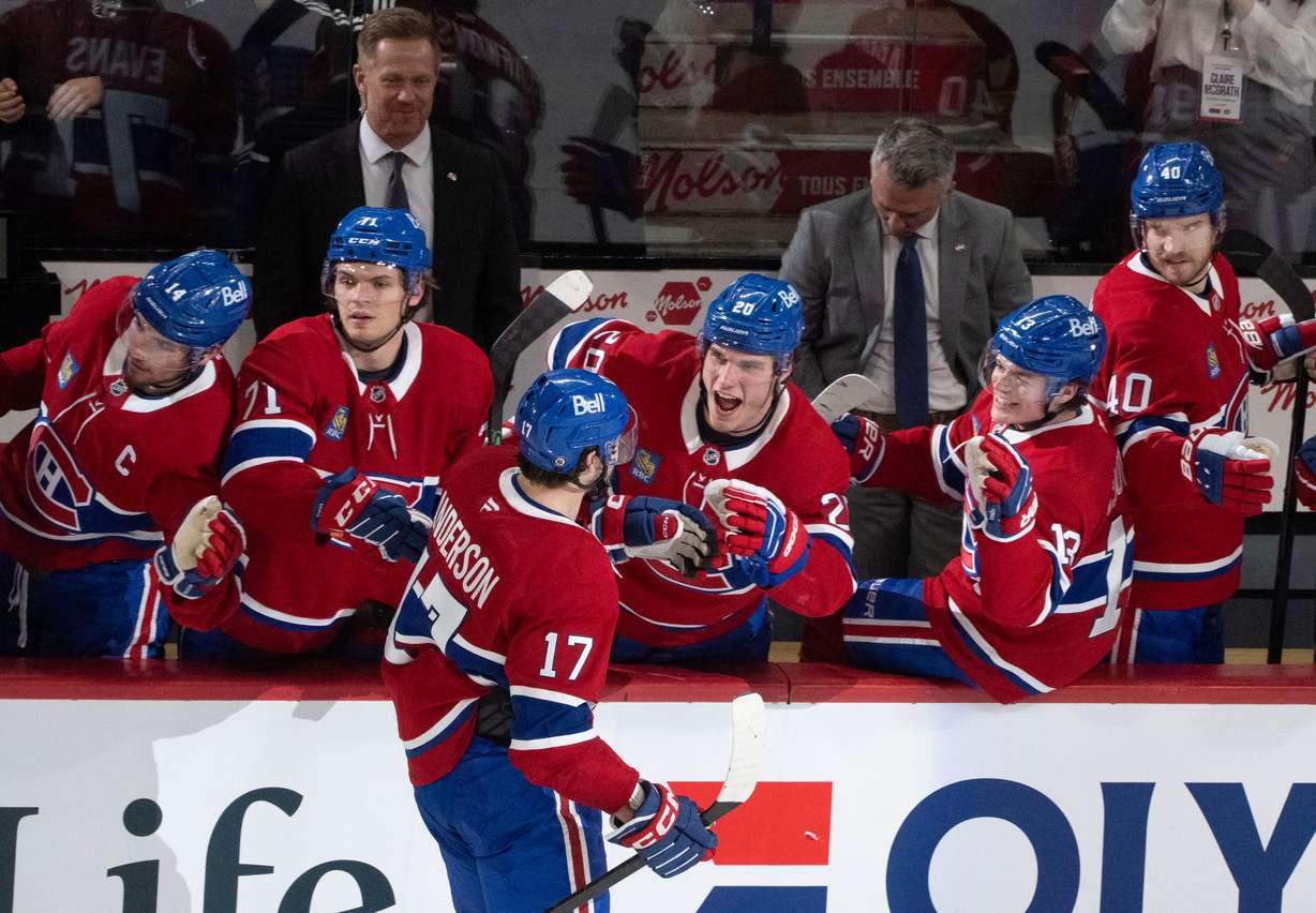 Montreal Canadiens' Josh Anderson (17) celebrates his go-ahead goal over the Detroit Red Wings with the bench during the third period of an NHL hockey game in Montreal on Tuesday.