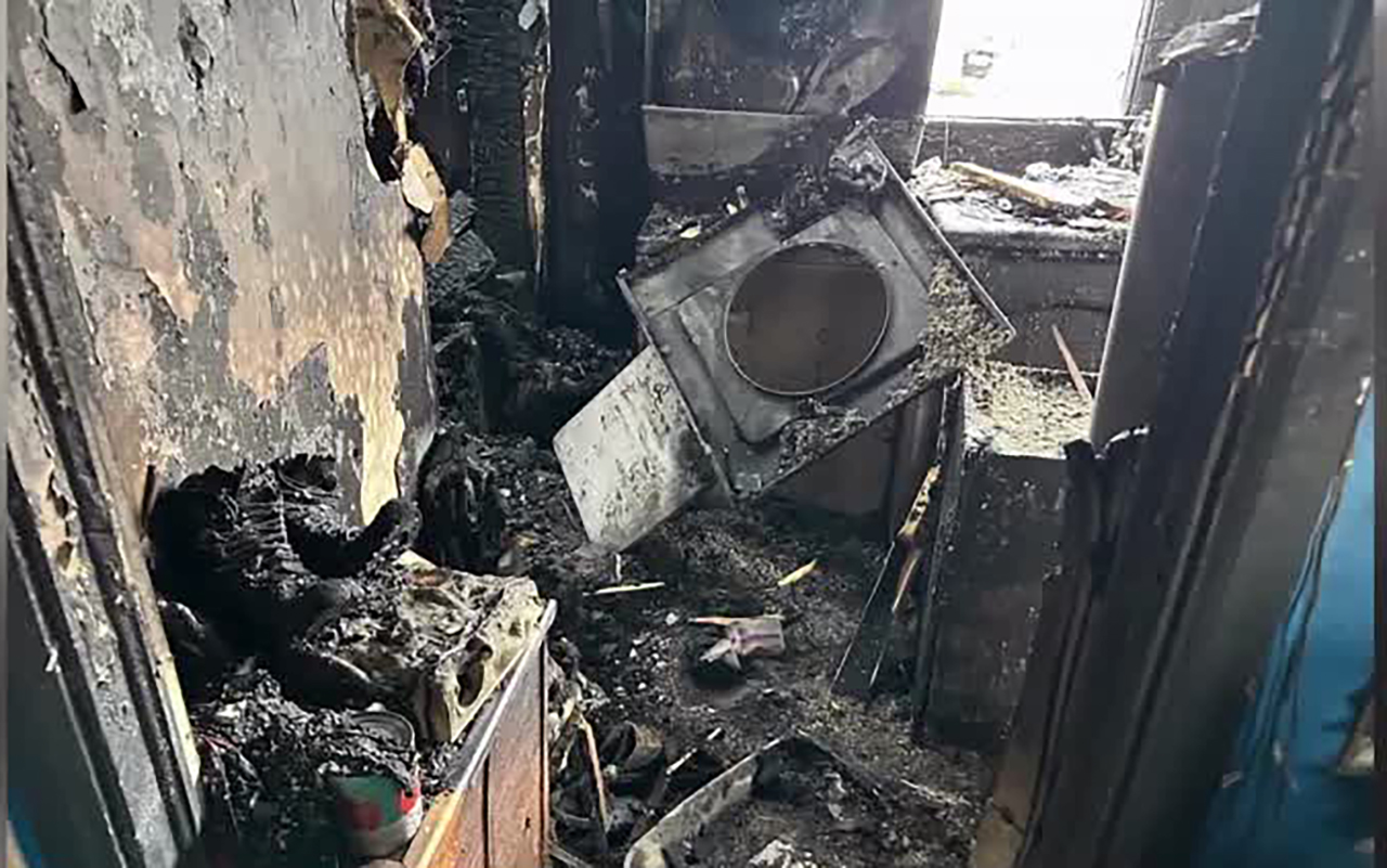 Damage is seen after fire broke out at the home of Kyla and Scott McClaughry, both volunteer firefighters in Emery County, last week. Two pet dogs died in the fire.