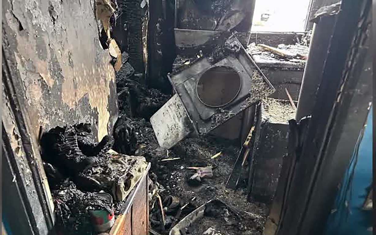 Damage is seen after fire broke out at the home of Kyla and Scott McClaughry, both volunteer firefighters in Emery County, last week. Two pet dogs died in the fire.