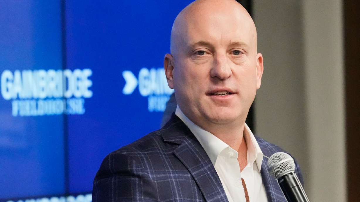 FILE - Group 1001 President & Chief Executive Officer Dan Towriss, also CEO of TWG Motorsports, speaks during a news conference in Indianapolis, Monday, Sept. 27, 2021.