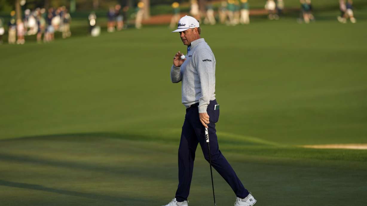Patton Kizzire waves after making a putt on the second hole during the first round at the Masters golf tournament, Thursday, April 10, 2025, in Augusta, Ga.