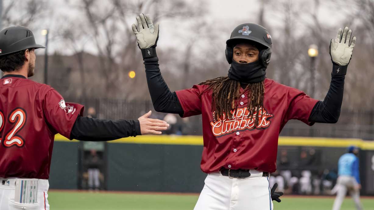 In this undated image provided by the Beloit Sky Carp, Sky Carp's Emaarion Boyd reacts on base during a minor league baseball game.
