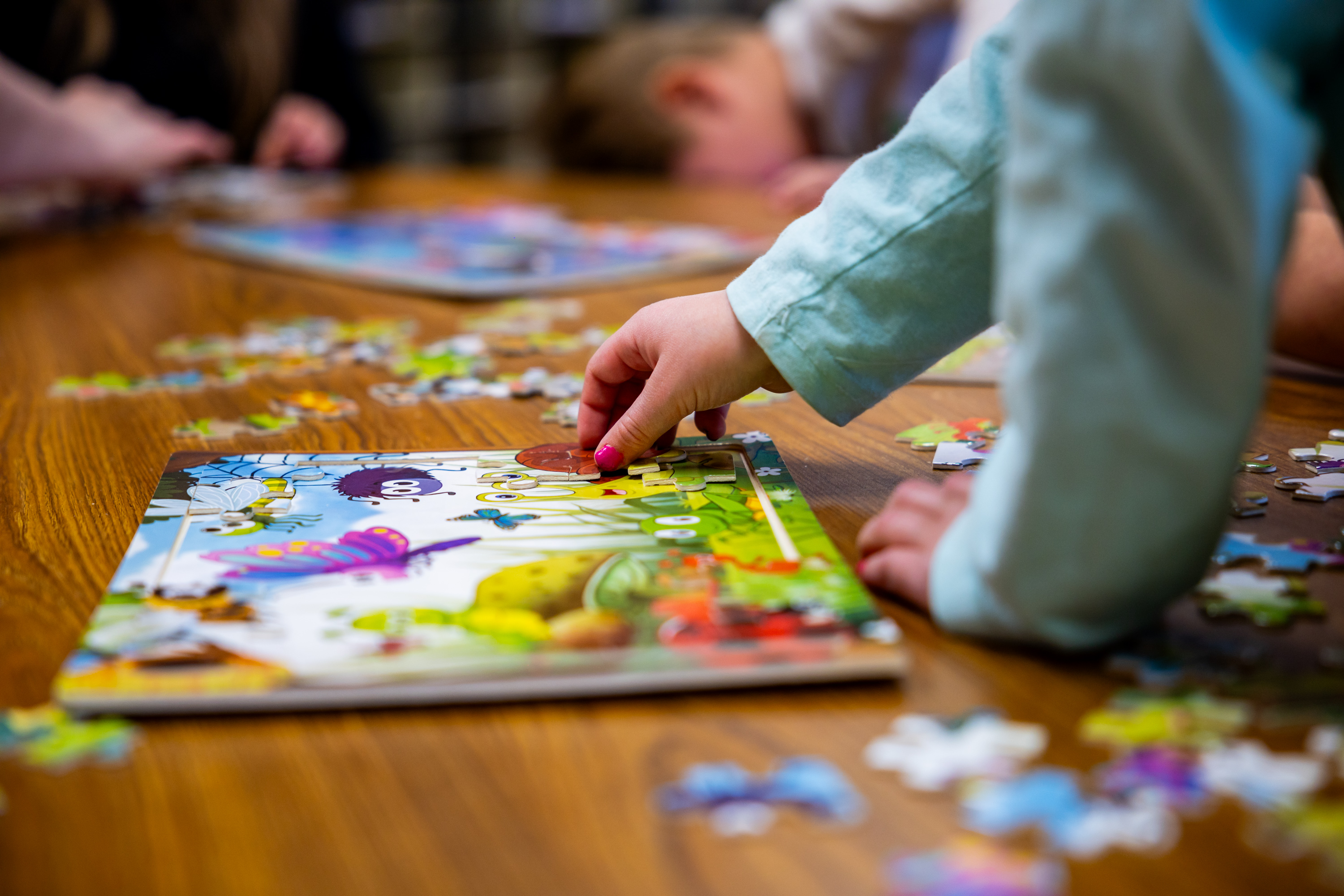 Kindergartners work on puzzles at Manti Elementary School on March 24. New Census Bureau data show Utah still has the highest percentage of children in the nation, but that number continues to shrink.