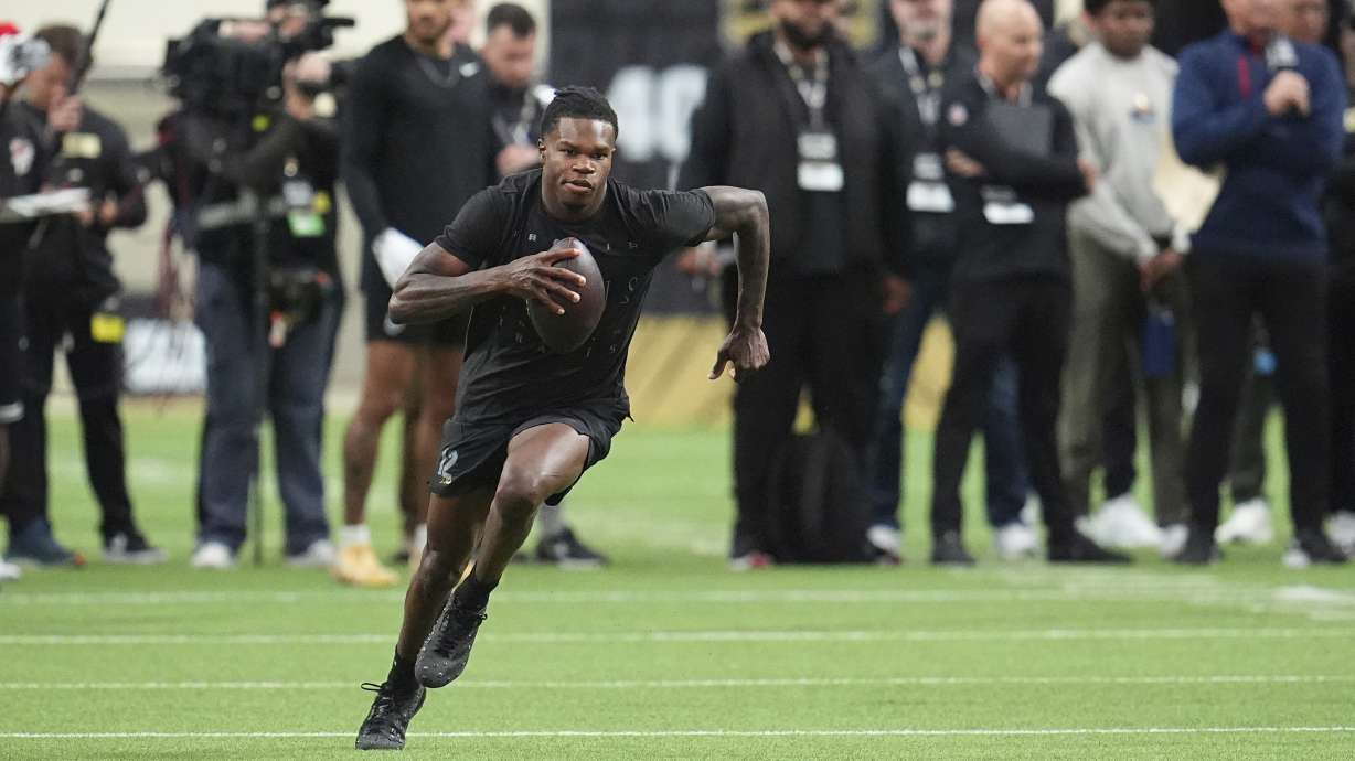 Colorado wide receiver Travis Hunter takes part in passing drills during the team's NFL football pro day Friday, April 4, 2025, in Boulder, Colo.