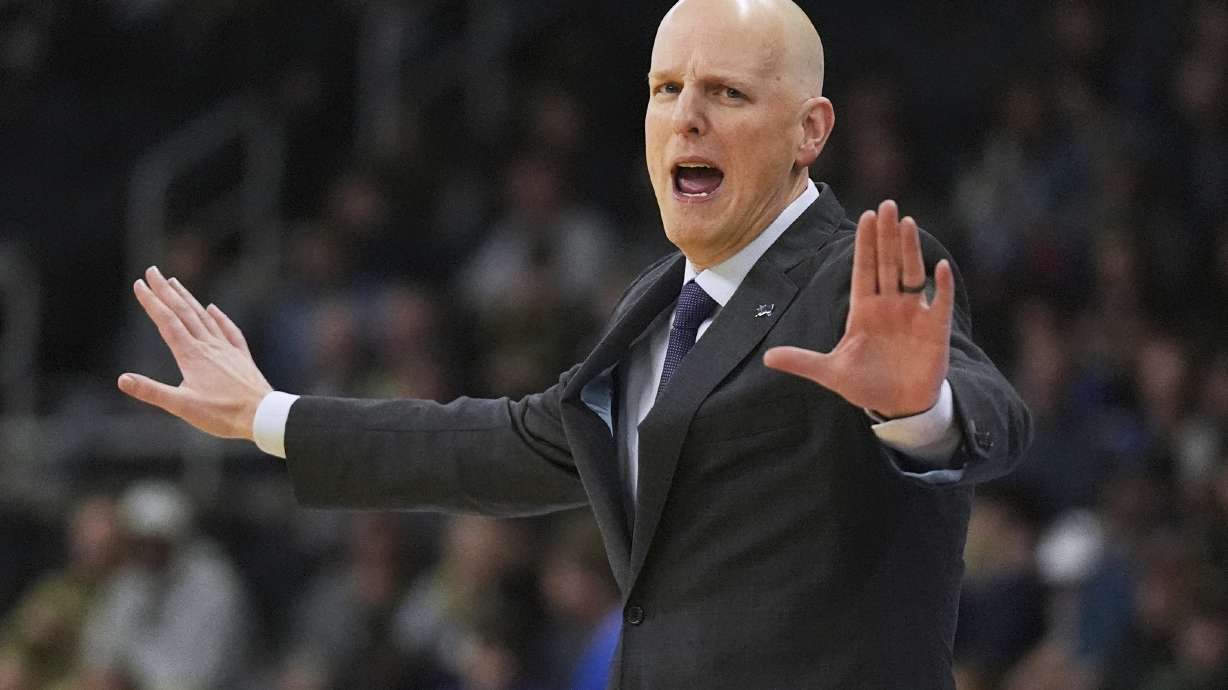 High Point head coach Alan Huss calls to his players during the first half in the first round of the NCAA college basketball tournament, Thursday, March 20, 2025, in Providence, R.I.