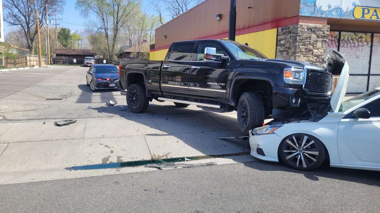A man in a stolen truck was arrested Thursday near 1800 S. State after investigators say he hit two unmarked police vehicles while trying to escape.