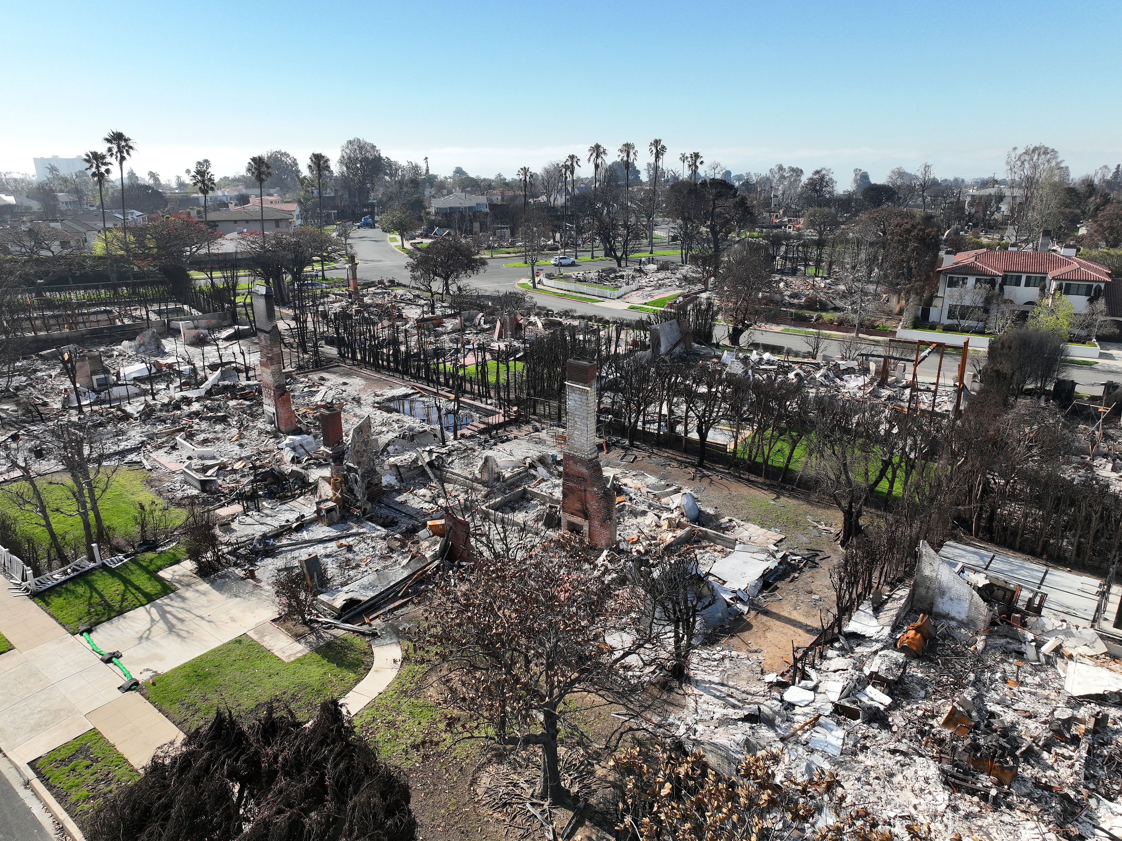 The Garff family home is pictured amid the ruins of other homes in Pacific Palisades, Calif., on Saturday, Feb. 22. It was one of many destroyed by the recent wildfires that swept through Southern California. The family is planning on rebuilding their home.