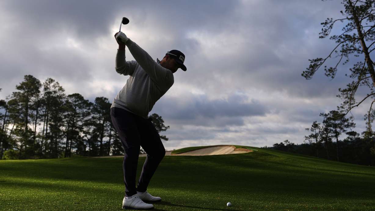 Thriston Lawrence, of South Africa, hits from the fairway on the second hole during the second round at the Masters golf tournament, Friday, April 11, 2025, in Augusta, Ga.