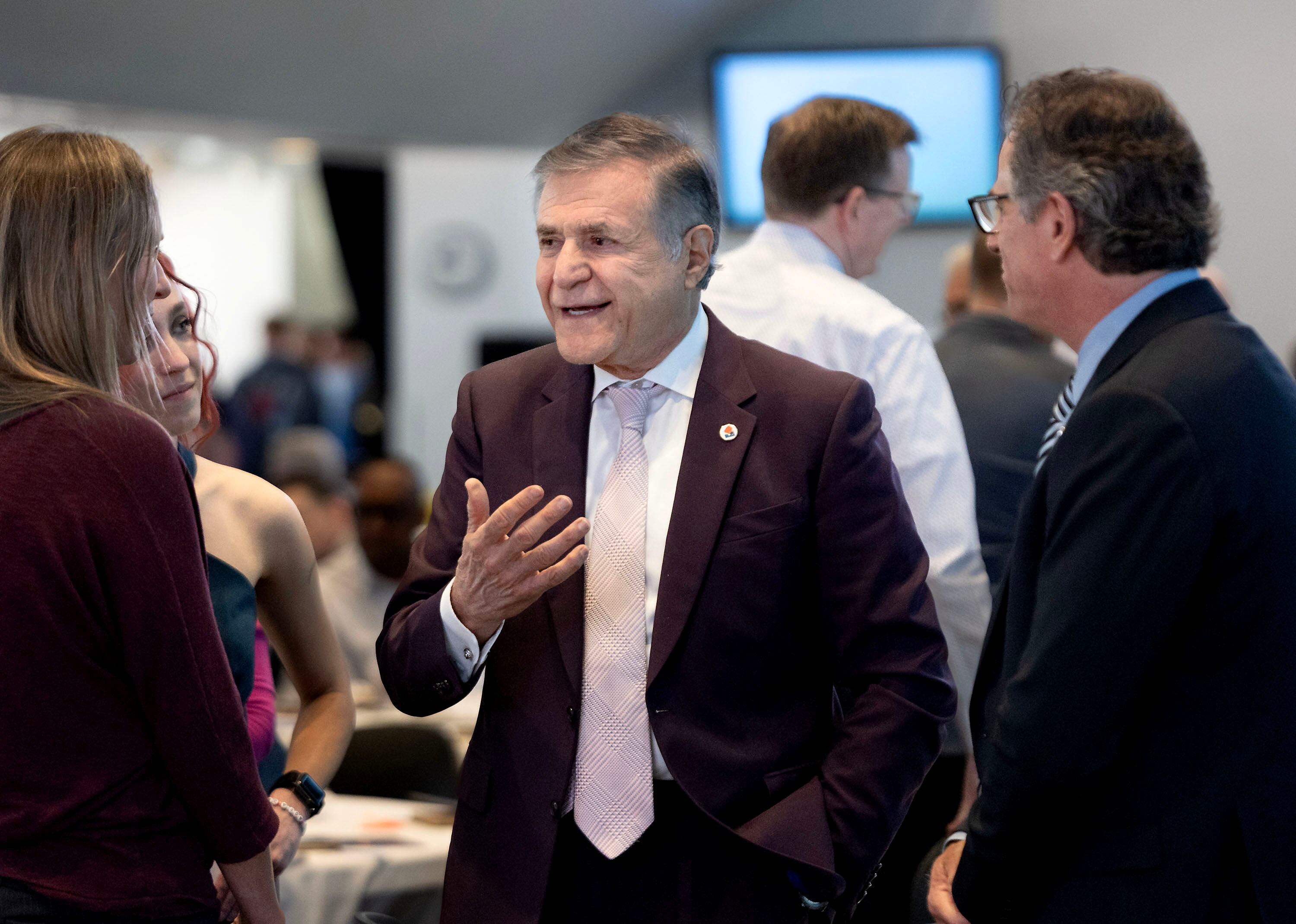 Khosrow Semnani, founder of the Semnani Family Foundation, center, speaks with attendees of the second annual Kindness Summit at the University of Utah in Salt Lake City on Friday, April 11, 2025. The Kindness Summit serves as a platform to inspire actionable change, foster collaboration and reinforce the importance of kindness in our communities, workplaces and institutions.