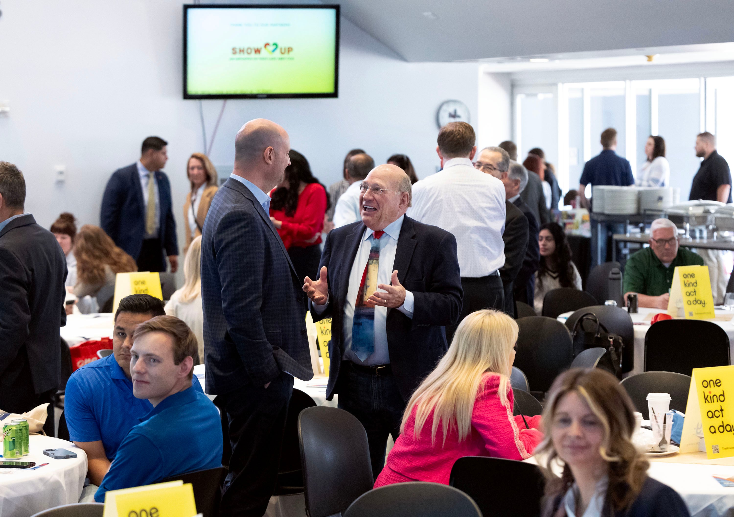 Jason Woodland and Doug White speak at the second annual Kindness Summit at the University of Utah in Salt Lake City on Friday, April 11, 2025. The Kindness Summit serves as a platform to inspire actionable change, foster collaboration and reinforce the importance of kindness in our communities, workplaces and institutions.