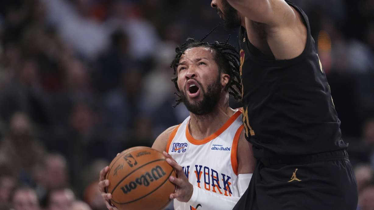 New York Knicks' Jalen Brunson draws a foul during the second half of an NBA basketball game against the Cleveland Cavaliers Friday, April 11, 2025, in New York.
