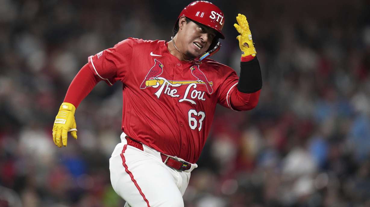 St. Louis Cardinals' Yohel Pozo rounds first on his way to an RBI double during the fifth inning of a baseball game against the Philadelphia Phillies Friday, April 11, 2025, in St. Louis.