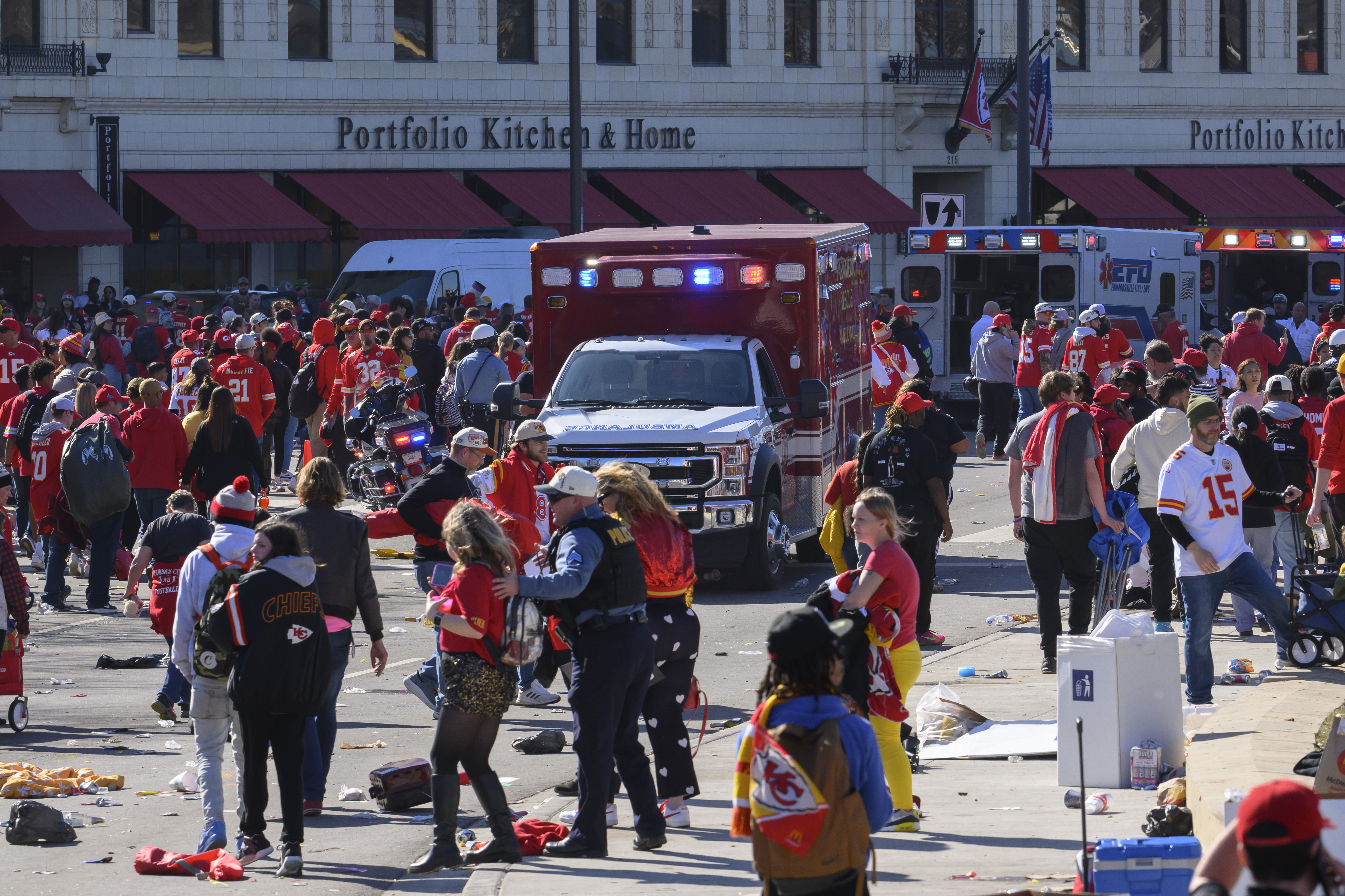 FILE - Police clear the area following a shooting at the Kansas City Chiefs NFL football Super Bowl celebration in Kansas City, Mo., Feb. 14, 2024. 