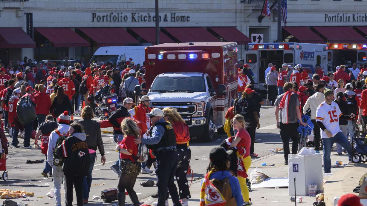 FILE - Police clear the area following a shooting at the Kansas City Chiefs NFL football Super Bowl celebration in Kansas City, Mo., Feb. 14, 2024.