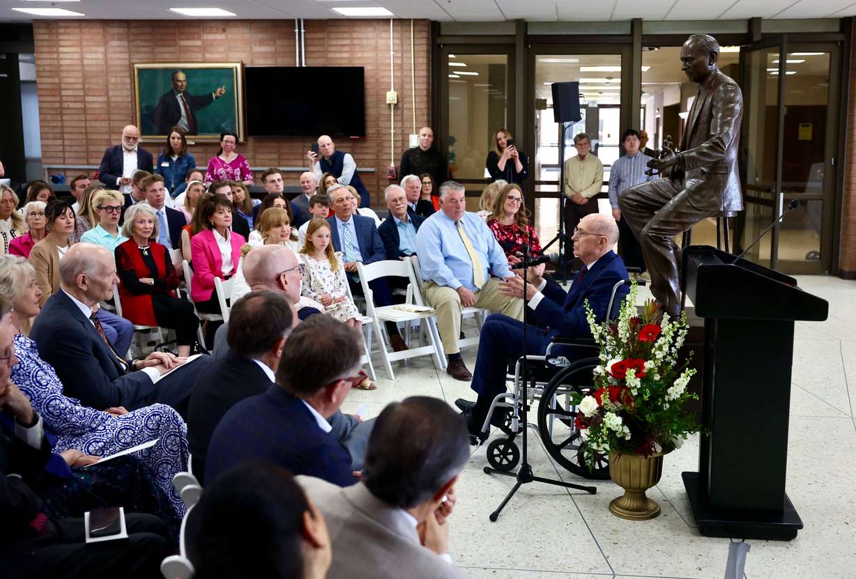 President Henry B. Eyring speaks to the audience after the statue of his father renowned chemist Dr. Henry Eyring was unveiled inside the Henry Eyring Building Atrium and the Department of Chemistry on University of Utah campus Saturday.