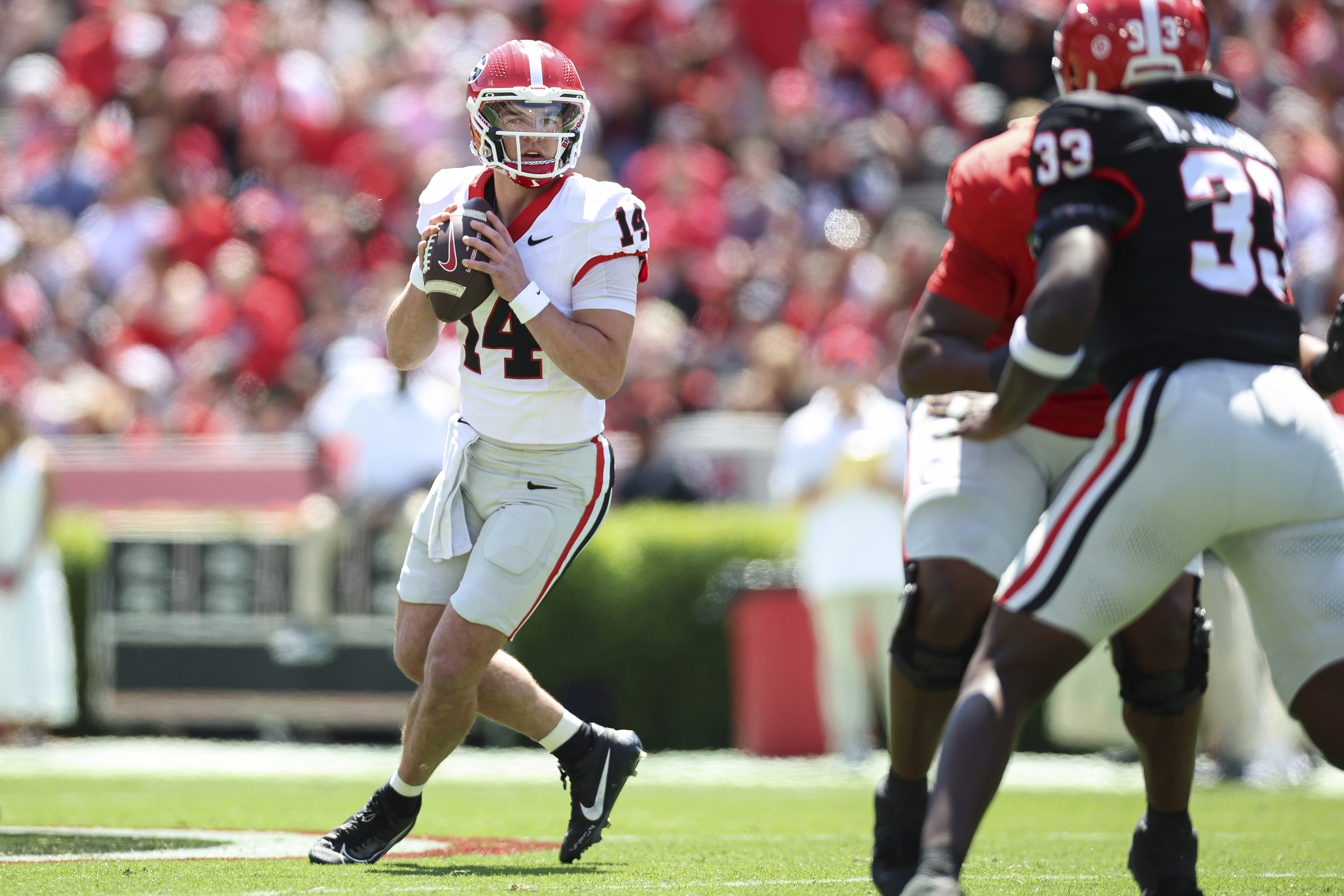 Georgia Red Team quarterback Gunner Stockton (14) looks to pass the ball during the NCAA college football team's spring game, Saturday, April 12, 2025, in Athens, Ga.