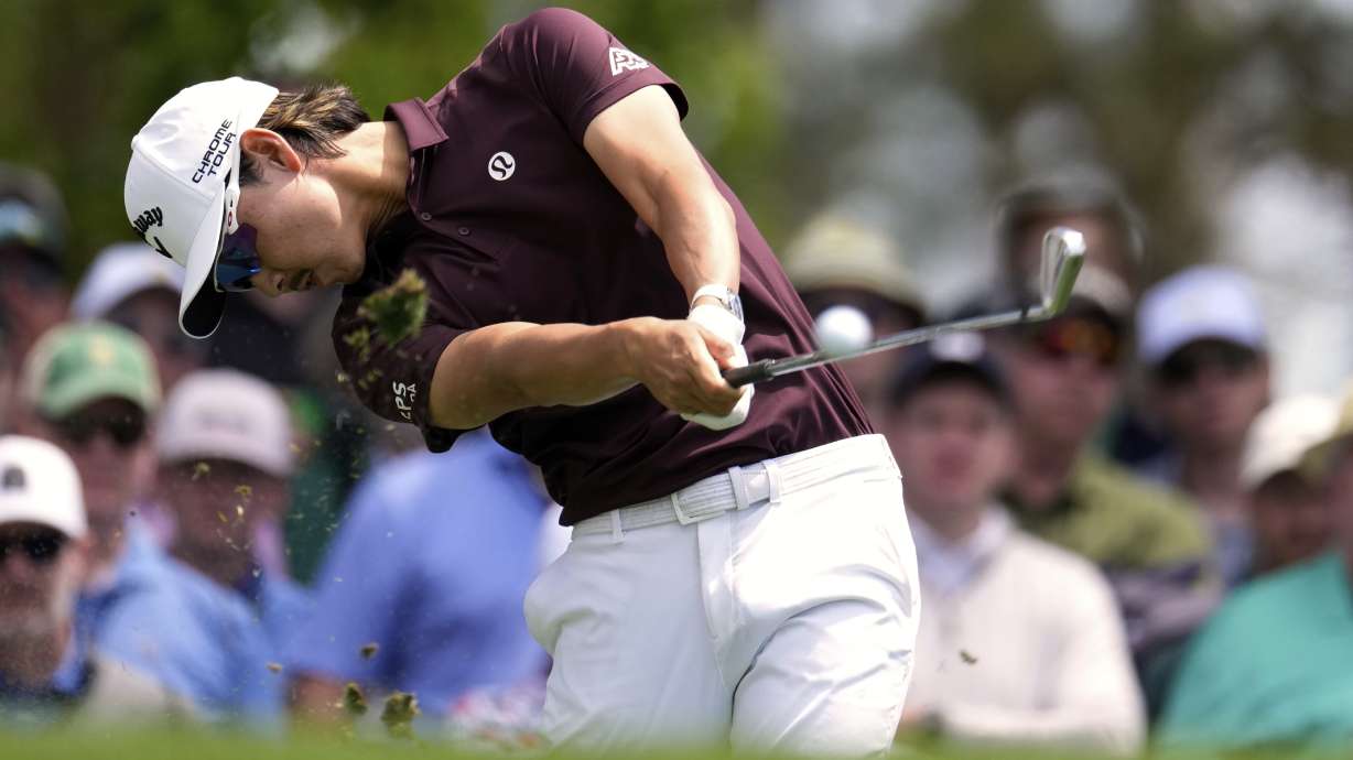 Min Woo Lee, of Australia, hits his tee shot on the fourth hole during the third round at the Masters golf tournament, Saturday, April 12, 2025, in Augusta, Ga.