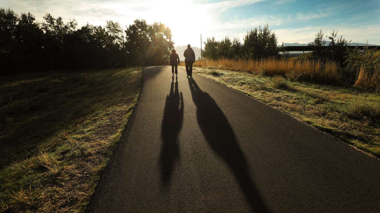 A couple walk along the Jordan River Parkway Trail in South Salt Lake on Sept. 24, 2019. The trail is listed as one of the six easiest to walk on the Wasatch Front.