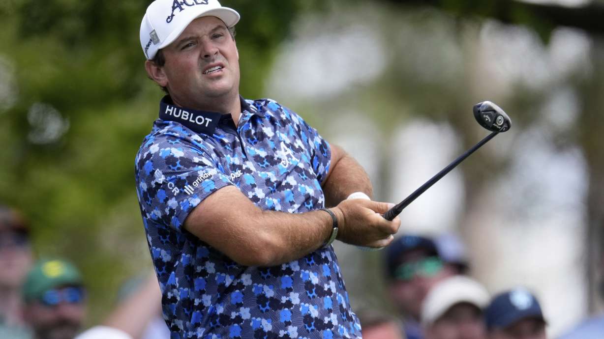 Patrick Reed watches his tee shot on the fourth hole during the third round at the Masters golf tournament, Saturday, April 12, 2025, in Augusta, Ga.