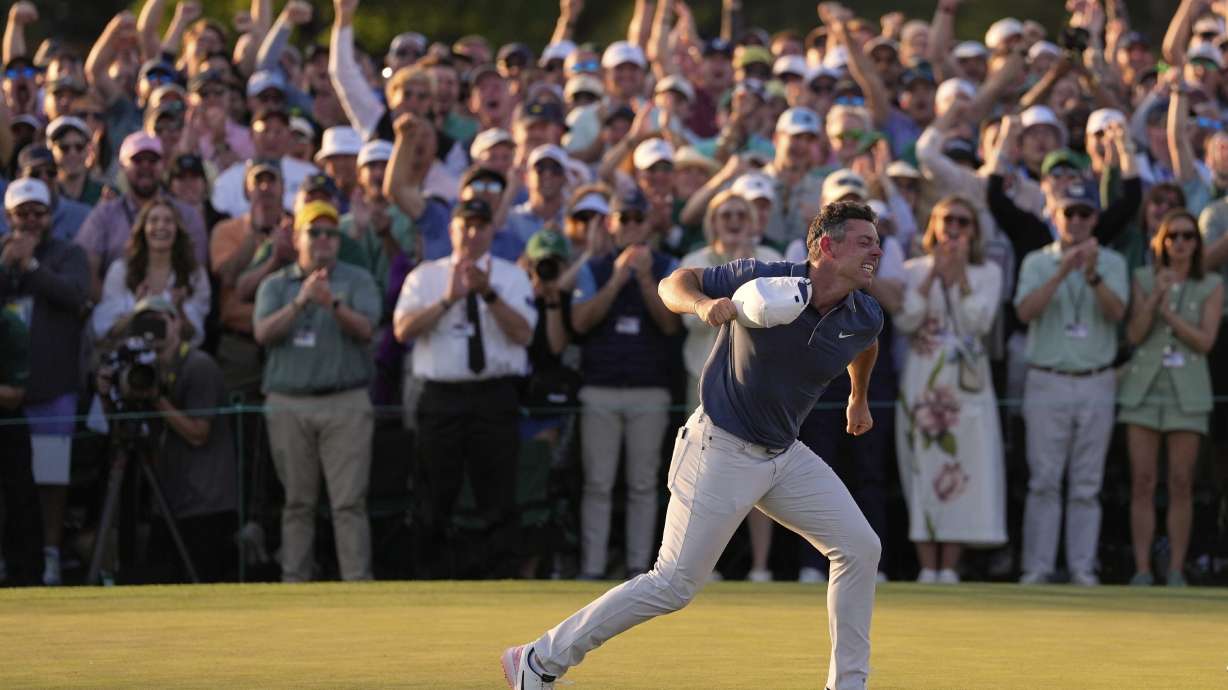 Rory McIlroy, of Northern Ireland, reacts after winning in a playoff against Justin Rose after the final round at the Masters golf tournament, Sunday, April 13, 2025, in Augusta, Ga.