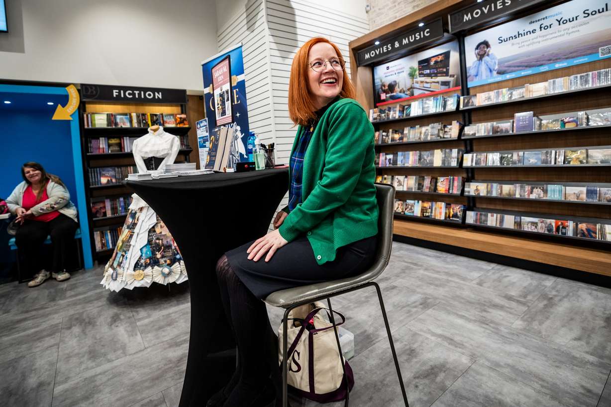 Author Sarah Eden signs books at a Deseret Book event at the City Creek Center in Salt Lake City on April 4.