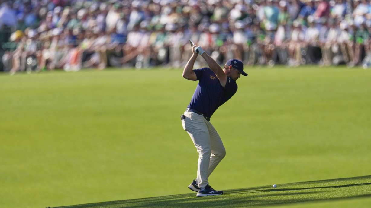 Bryson DeChambeau hits from the fairway on the 13th hole during the final round at the Masters golf tournament, Sunday, April 13, 2025, in Augusta, Ga.