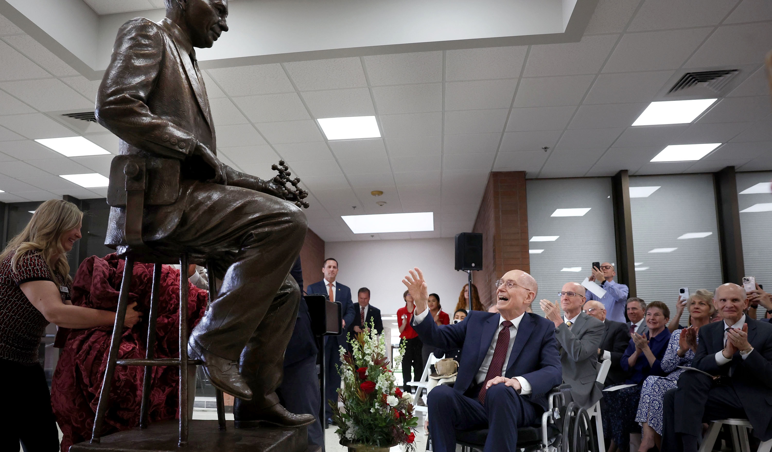 President Henry B. Eyring, counselor in the First Presidency of The Church of Jesus Christ of Latter-day Saints, admires the statue unveiled of his father, renowned chemist Dr. Henry Eyring, at the University of Utah campus Saturday.