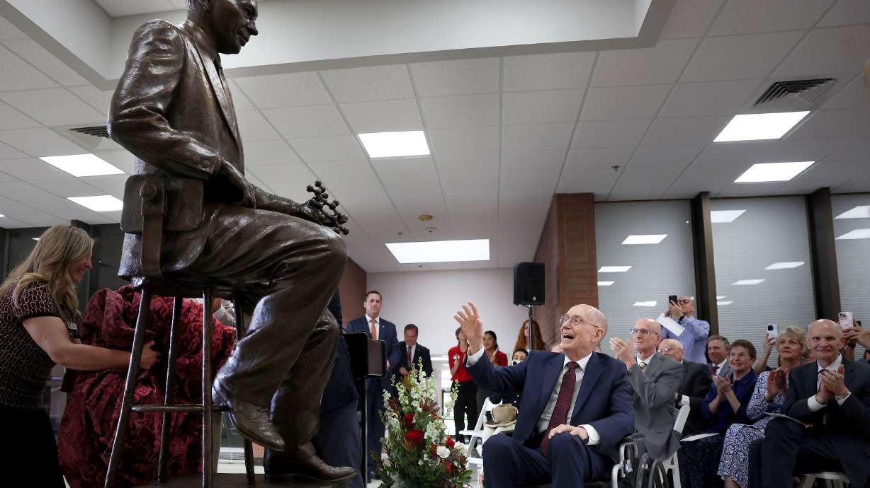 President Henry B. Eyring, counselor in the First Presidency of The Church of Jesus Christ of Latter-day Saints, admires the statue unveiled of his father, renowned chemist Dr. Henry Eyring, at the University of Utah campus Saturday.