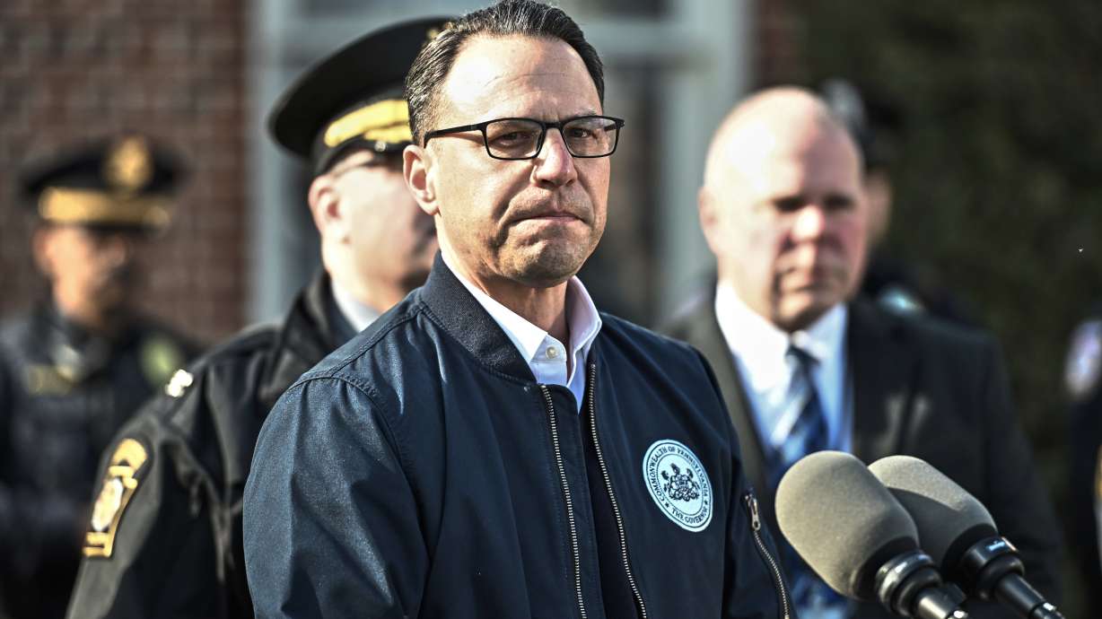 Pennsylvania Gov. Josh Shapiro pauses during a news conference at the governor's official residence discussing the alleged arson that forced him, his family and guests to flee Sunday, in Harrisburg, Pa.