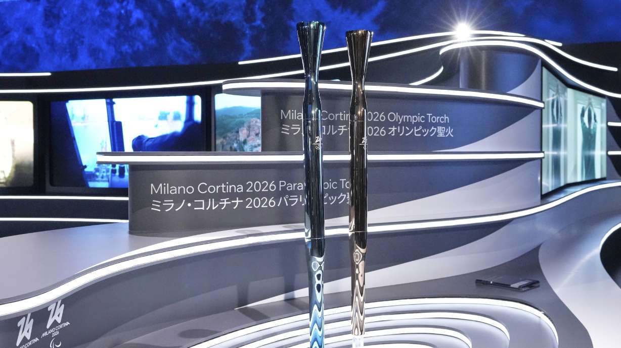 The torches for the Olympic and Paralympic Winter Games Milano Cortina 2026 are unveiled during the official unveiling ceremony at Italian Pavilion of Osaka Expo 2025 in Osaka, western Japan, Monday, April 14, 2025.