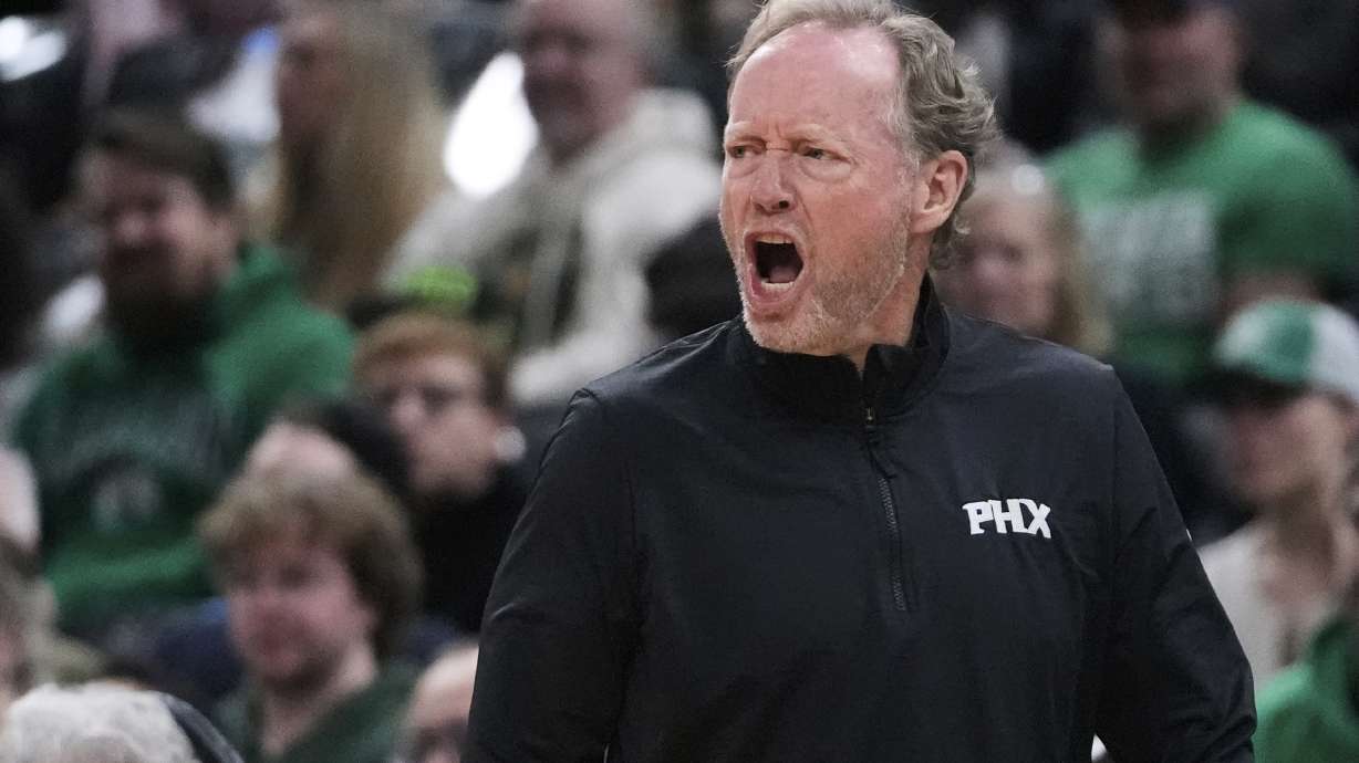 Phoenix Suns head coach Mike Budenholzer calls to his players during the first half of an NBA basketball game against the Phoenix Suns, Friday, April 4, 2025, in Boston.