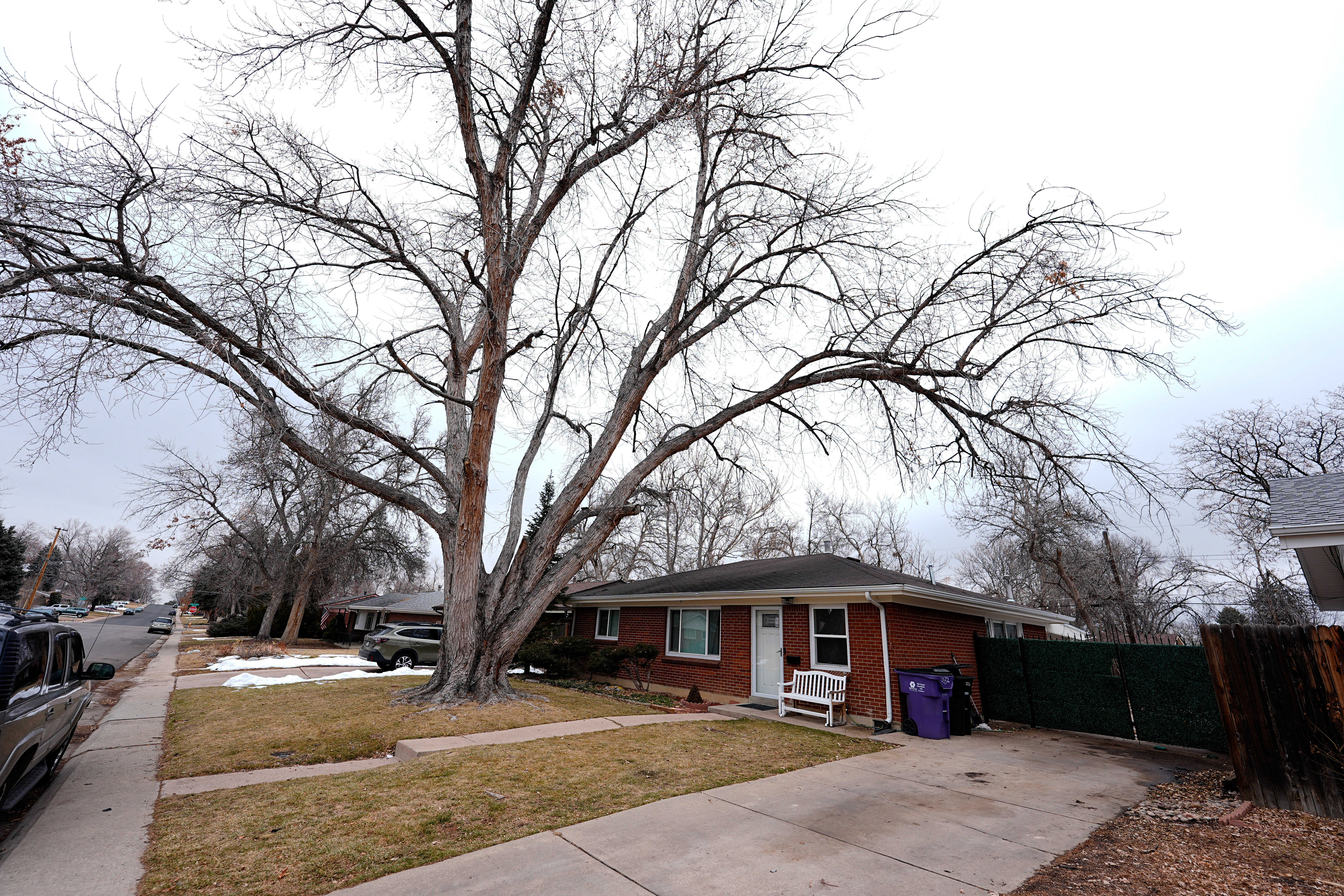 The residence where a former funeral home owner kept a deceased women's body in a hearse for two years, as well as the remains of 30 cremated people, is shown Feb. 16, 2024, in southwest Denver. On Monday, the funeral home owner pleaded guilty to several charges.
