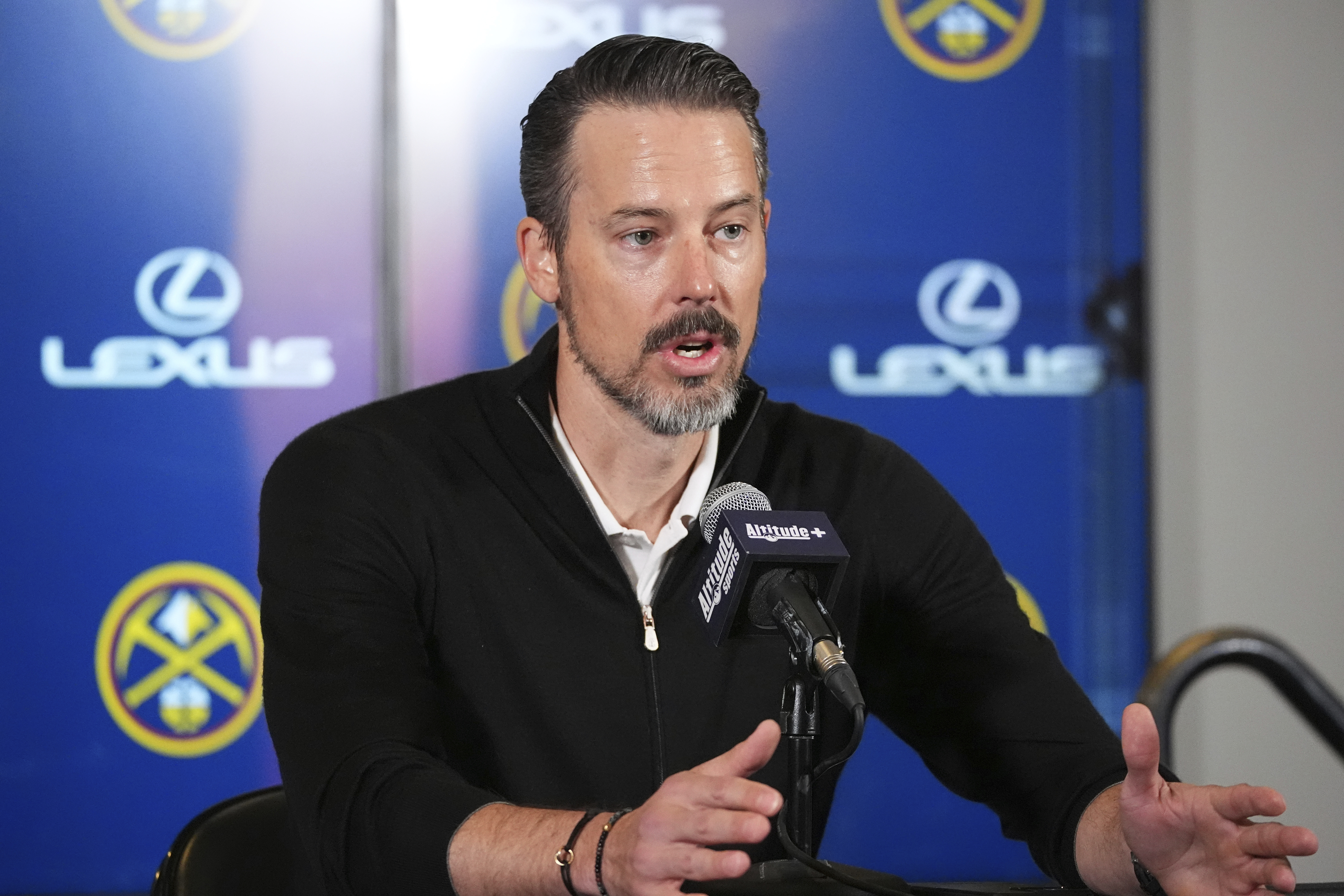 Denver Nuggets team president Josh Kroenke responds to questions at a news conference Monday, April 14, 2025, in Denver about the firing of the team's general manager and head coach last week.