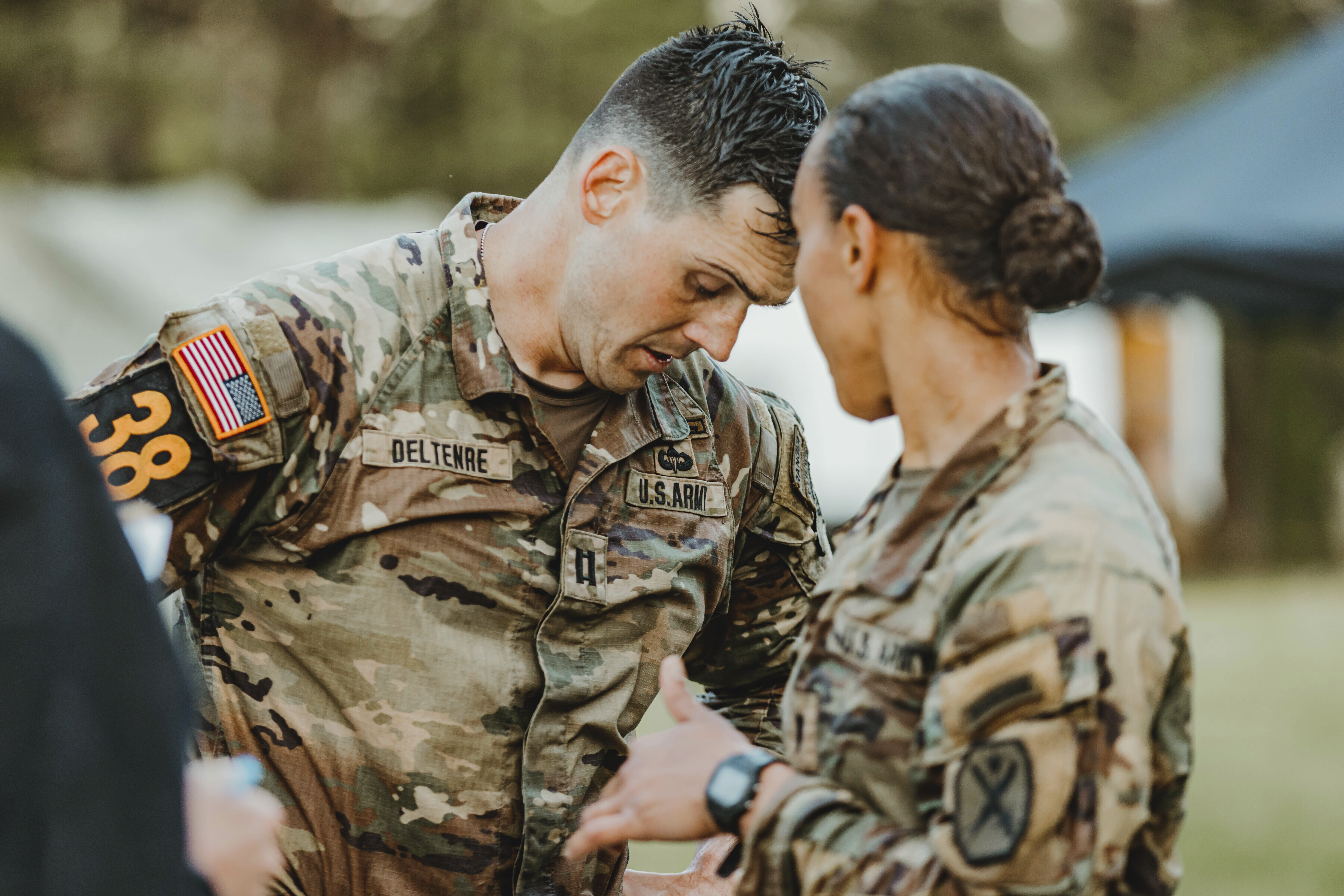 Capt. Seth Deltenre, left, and 1st Lt. Gabrielle White, from the Maneuver Center of Excellence, compete during the Malvesti obstacle course in the 2025 Best Ranger Competition, April 11, at Camp Rogers in Fort Benning.