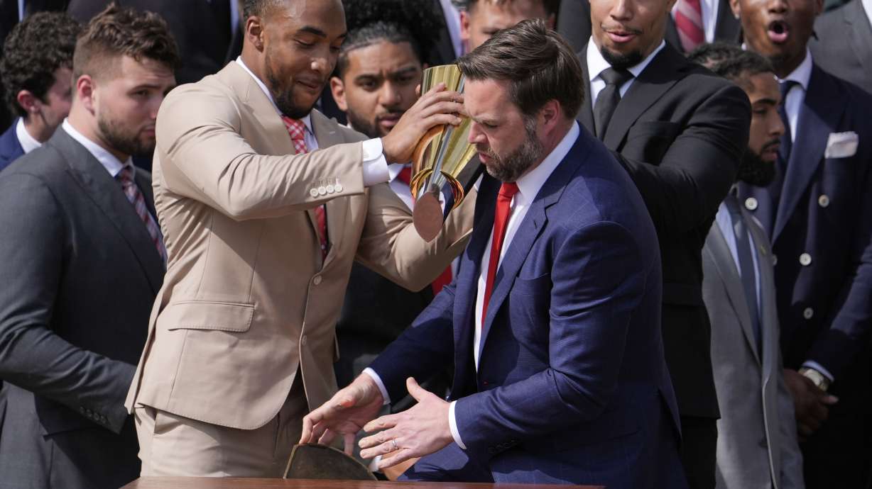 Vance fumbles Ohio State's NCAA football championship trophy as ...