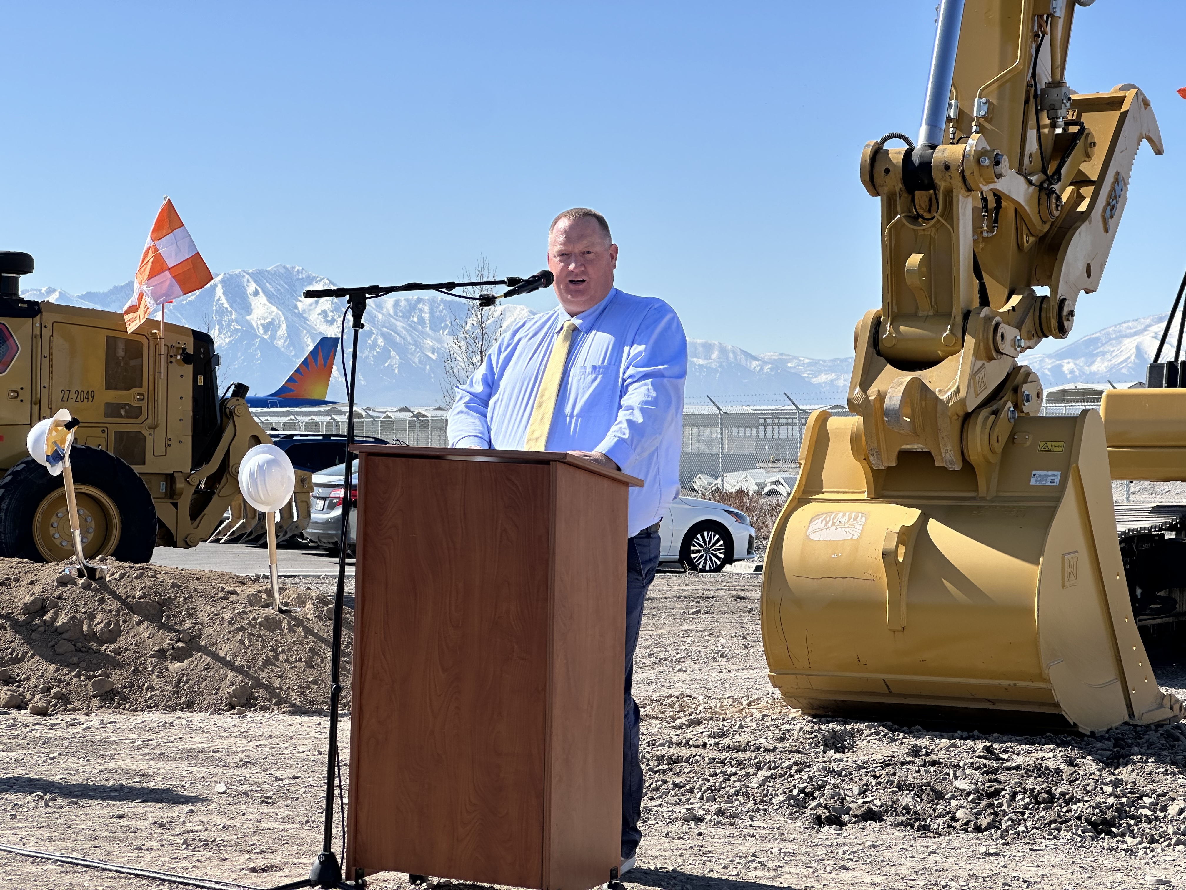 Provo Airport Director Brian Torgersen speaks at a groundbreaking ceremony for a three-year project to expand the Provo Airport on Monday.