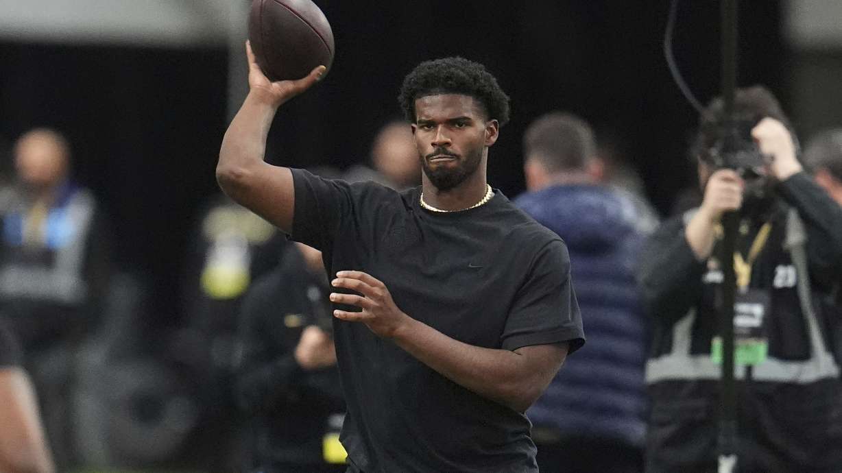 Colorado quarterback Shedeur Sanders takes part in passing drills during Colorado's NFL football pro day Friday, April 4, 2025, in Boulder, Colo.