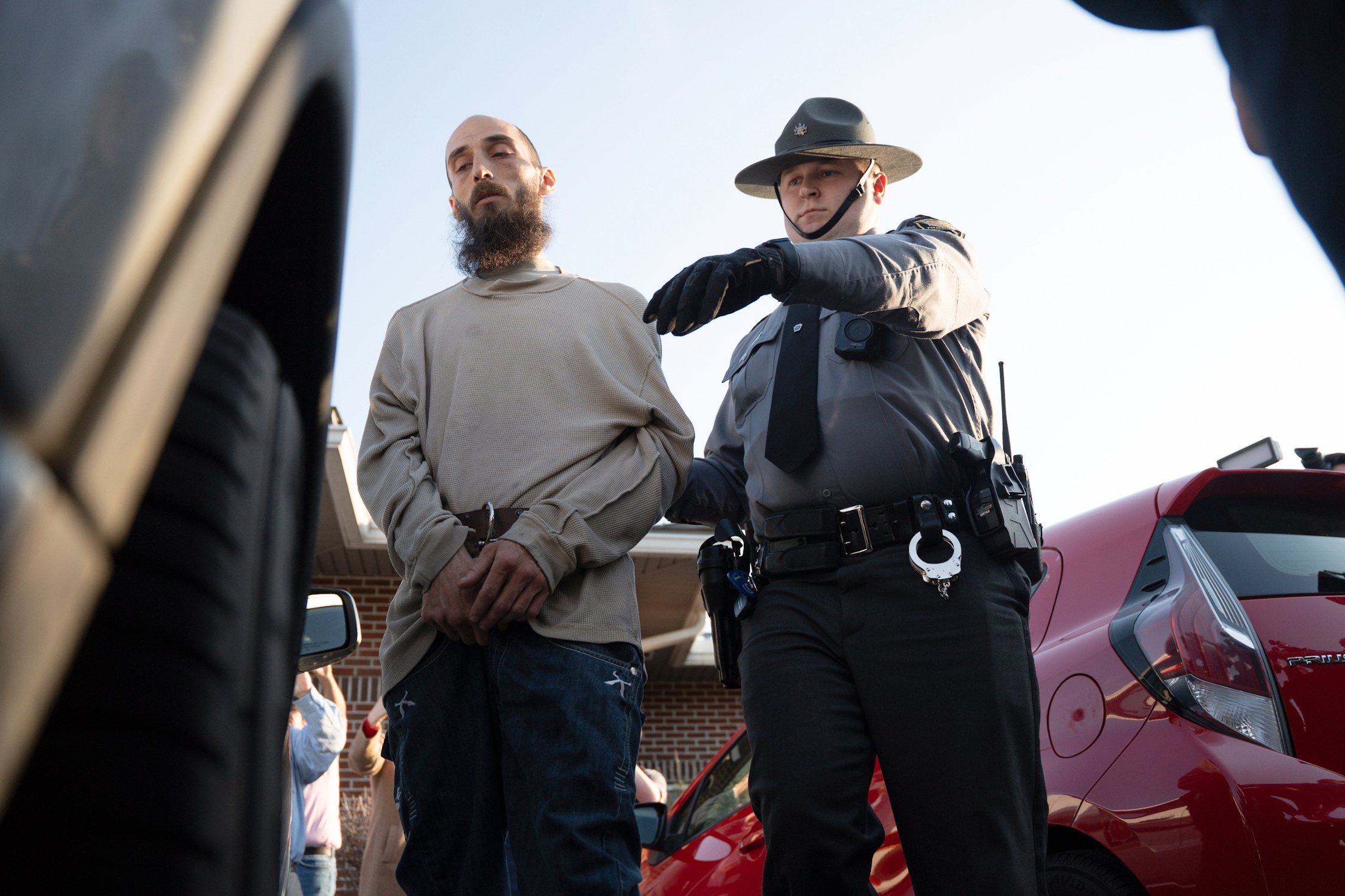 Cody Balmer is escorted from court after his preliminary arraignment on Monday in Harrisburg, Pa. Balmer's brother said Tuesday Cody Balmer has struggled with mental illness, twice being treated at a psychatric hospital.