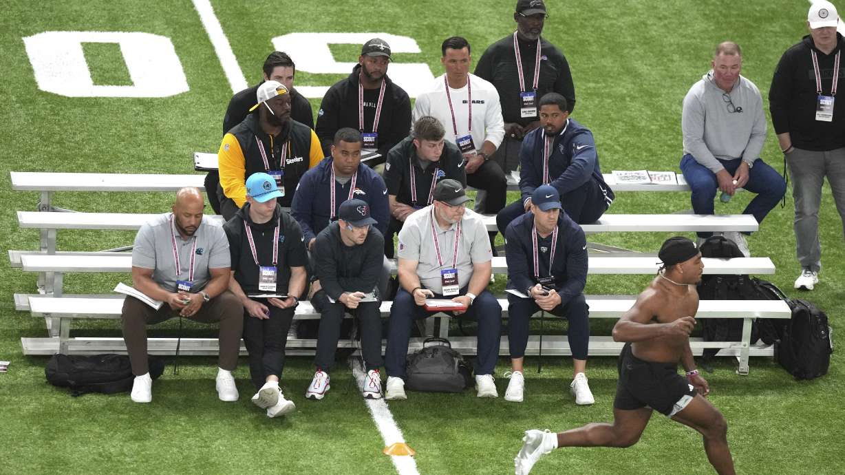 Scouts watch Texas A&M tight end Shane Calhoun during the school's NFL football pro day, Thursday, March 27, 2025, in College Station, Texas.