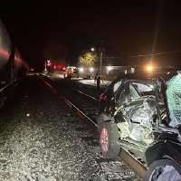 Surveillance video captures narrow escape from Springville railroad tracks as train impacts car