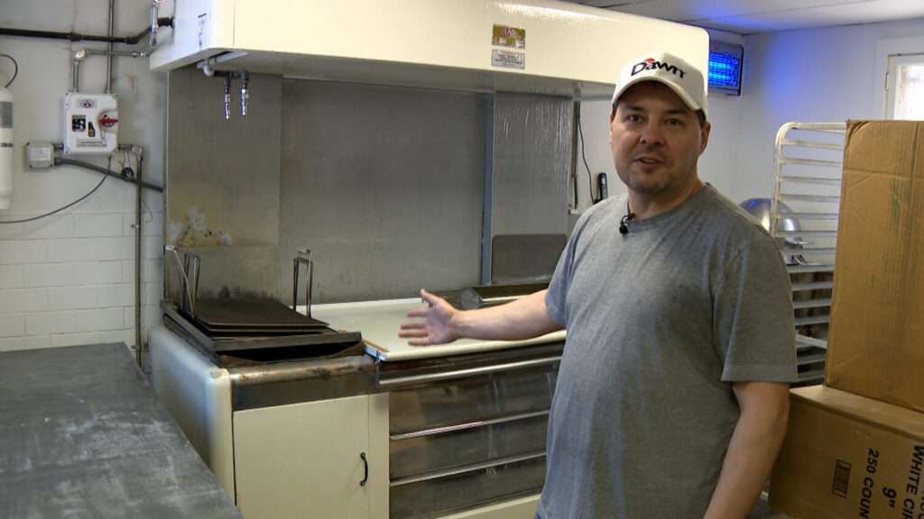 An antique donut fryer is pictured in Topper Bakery in Ogden on Monday. The owners said they are nearly ready to fully reopen after a fire in 2021.