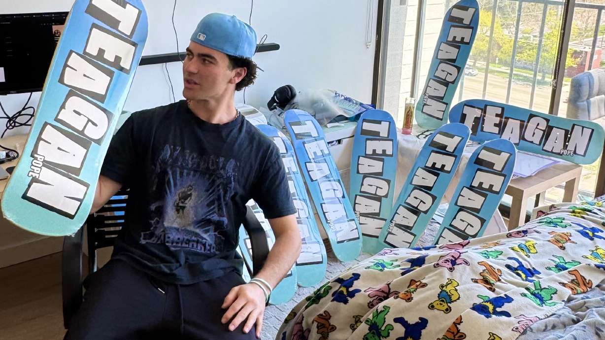 Cole Brunner with several skateboard decks he commissioned in memory of his friend Teagan Pope, who died by overdose at 22 years old. Brunner created an overdose prevention program and held a memorial in his memory this month.