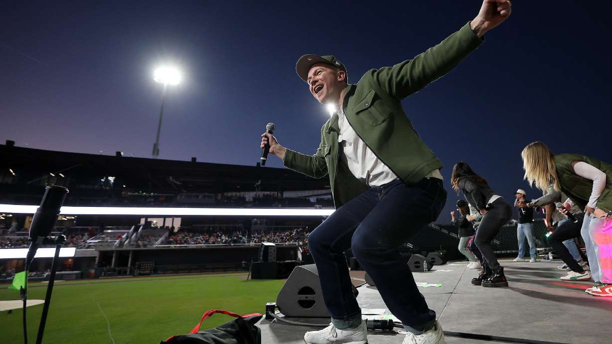 Brydon Brett performs with The King Will Come at the Why I Believe Interfaith Easter Celebration at the Ballpark at America First Square in South Jordan on Monday.