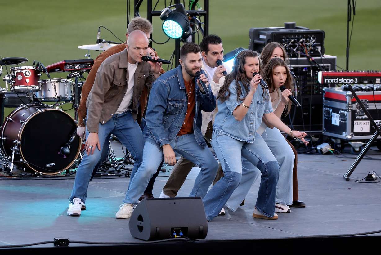 J209 performs at the Why I Believe Interfaith Easter Celebration at the Ballpark at America First Square in South Jordan on Monday.