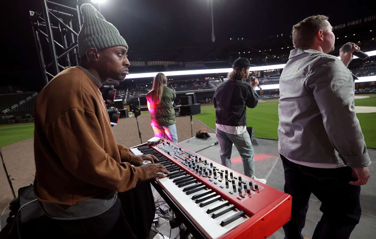 Myles Mann performs with The King Will Come at the Why I Believe Interfaith Easter Celebration at the Ballpark at America First Square in South Jordan on Monday.